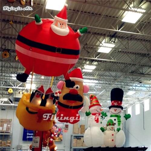 Customized Hanging Inflatable Christmas Santa Claus with Penguins for Ceiling Decoration