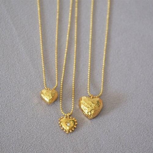 Fashion niche simple retro concave and convex pattern love pendant brass bean chain necklace female