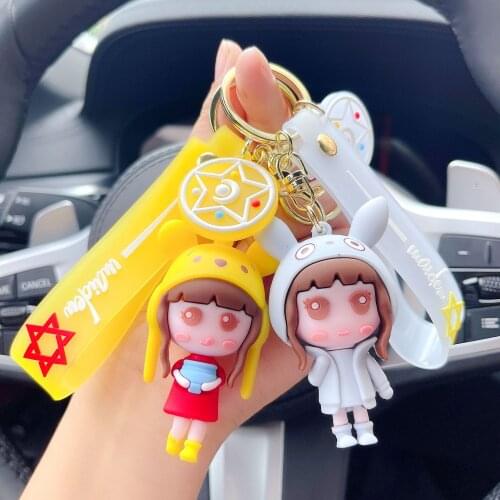 Creative cute cross-dressing girl car backpack key ring ring pendant small gift