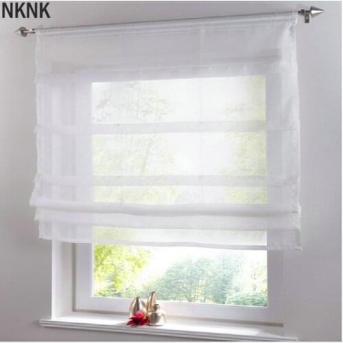 NKNK Roman Blinds On The Windows