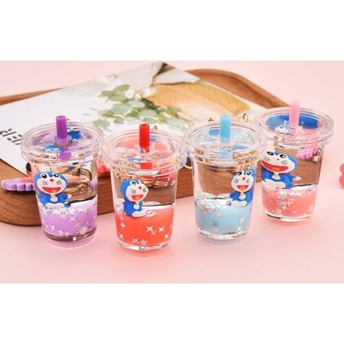 Creative Acrylic Milk Tea Cup Keychain Cartoon Blue Cat Doll Floating Liquid Keyring Accessories Couple Bag Key Holder Gifts
