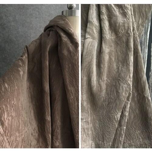 Compressed texture camel color composite pleated creative art designer fabric