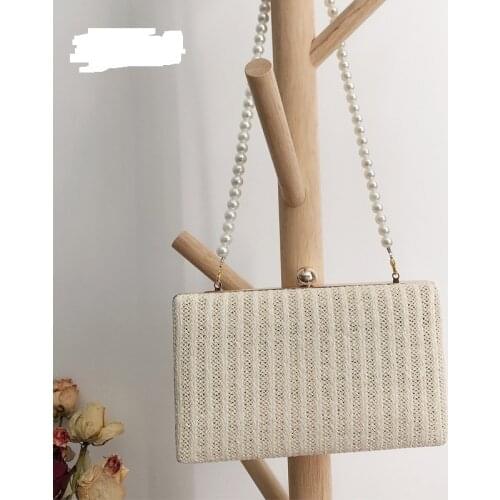 2021 spring new banquet makeup clutch female elegant pure color straw woven handbag with dress bridal shoulder messenger bag