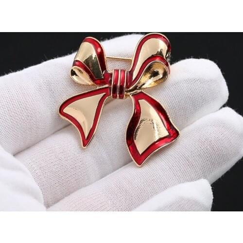 Bow brooch dripping oil fashion vintage court metal high sense creative brooch brooch coat windbreaker cardigan