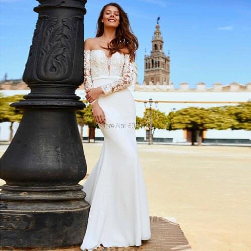 Sexy Sheer Neckline Mermaid Wedding Dresses 2021 Lace Appliques Long Sleeves Wedding Gowns Modest Satin Formal Bride Dress