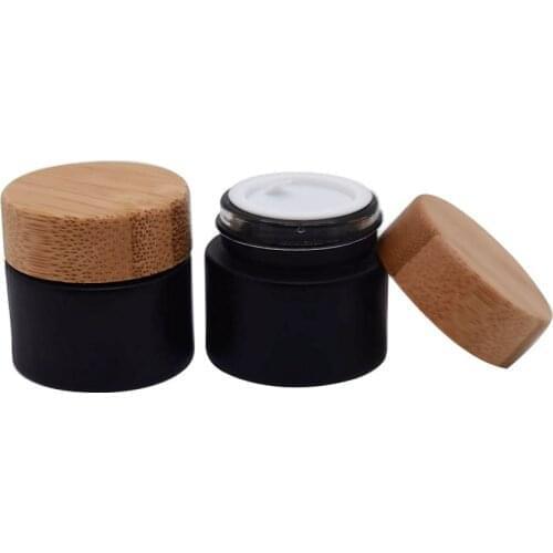 Factory Wholesale Price 360pcsMatte Black Cosmetic Cream jar with Bamboo Lid Glass Empty Bottle Skin Cream Packaging Container