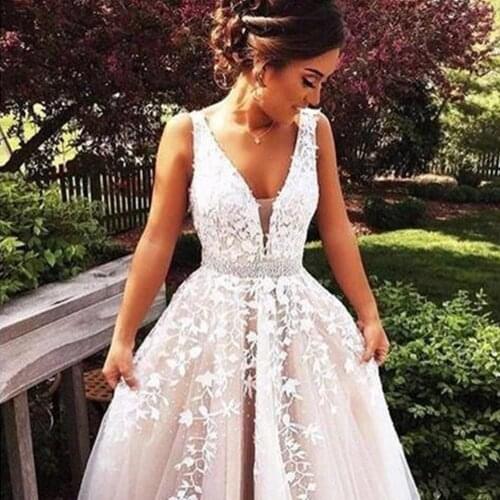 Backless Wedding Dresses A-line Deep V-neck Tulle Appliques Beaded Boho Dubai Arabic Wedding Gown Bridal Dress Vestido De Noiva