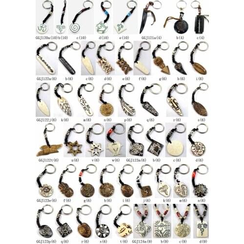 Mix Wholesale 100pcs Tibet Engraved Yak Bone Lovely Amulet Totem Keychains for Promotion Gift