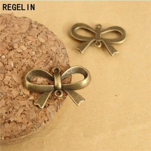 REGELIN Charms Bow Tie Connectors Pendant Antique bronze Zinc Alloy 50pcs 21x15mm Fit Bracelet Necklace DIY Jewelry Findings