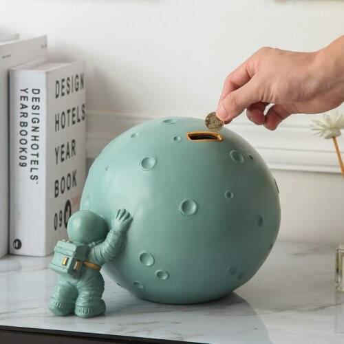 Creative cartoon push the moon piggy bank Modern space art desktop decoration saving box