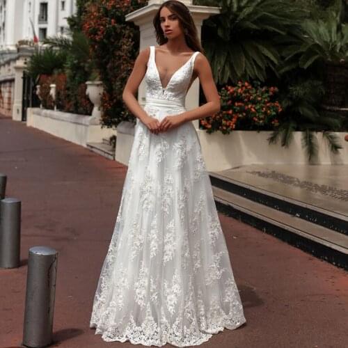 Elegant V-neck Sleeveless Lace Wedding Gown with Pearls Floor-length A-line Bridal Dress Vestido de Novia