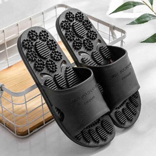 Unique massage slippers anti-slip fashion wear a word cool drag beach trend Korean version of the family indoor mens sandals