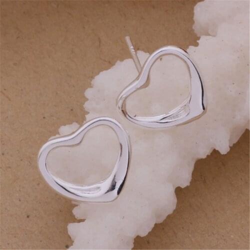 E099 Hot new factory direct silver color jewelry fashion charm women simple caring earrings free shipping