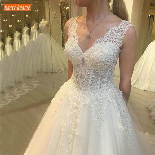 Elegant Boho White V Neck Wedding Gowns Sleeveless Lace Applique Beaded Bride Dresses Long 2020 Floor Length Ivory Wedding Dress