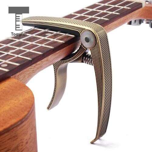 Tooyful Guitar Capo Quick Change Clamp Key Zinc Alloy With Guitar Pick for Acoustic Classic Electric Bass Ukulele Guitar Bronze
