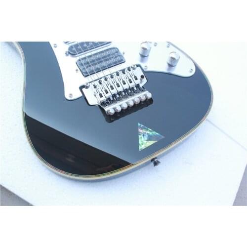 Custom 7 string black guitar,shell binding,mirror pickguard,HSH pickups,tremolo bridge,,neck bolt on body