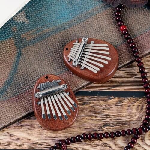 8 Keys Kalimba Mini Kalimba Portable Thumb Piano Finger Holiday Keyboard with Gift Pocket Percussion Kalimba Pendant For Ki O4B7