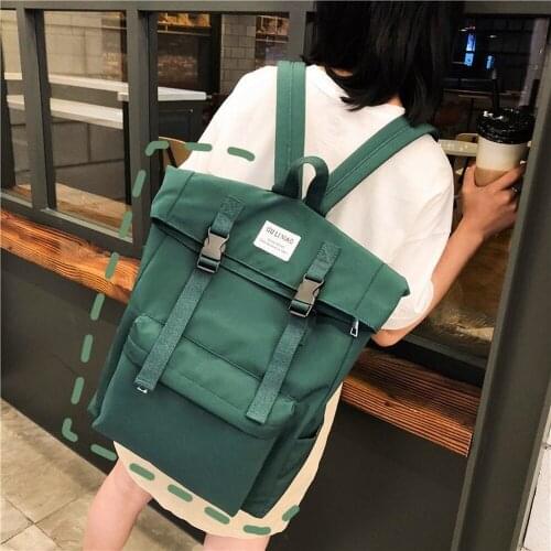 Korean version of the campus waterproof casual student backpack Japanese version of the solid color lock lock schoolbag