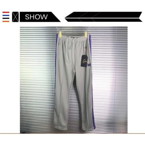 Meichao needles leisure sports pants embroidered butterfly side Jacquard Ribbon pants ins school pants