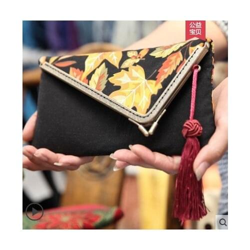Factory wholesale sales of the latest embroidery handmade DIY material bag European creative coin purse