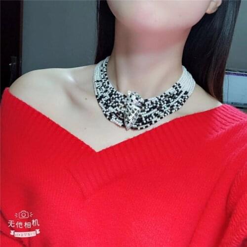 Hand knotted white freshwater pearl temperament micro inlay zircon lion clasp accessories collarbone chain necklace