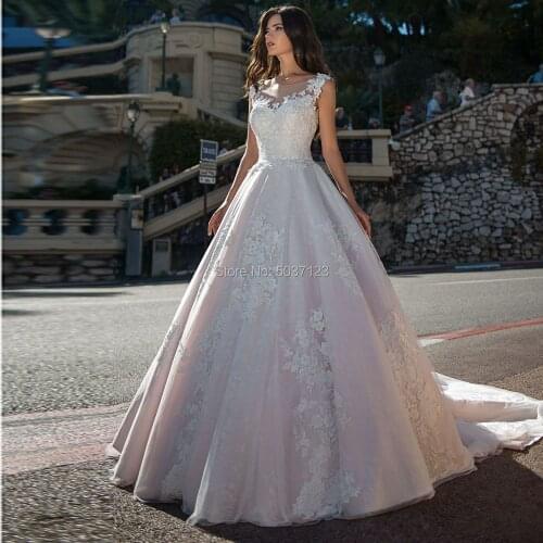 Light Pink Wedding Dresses 2021 Lace Appliques Sleeveless Bridal Gowns A-Line Buttons Court Train Vestido De Noiva Plus Size