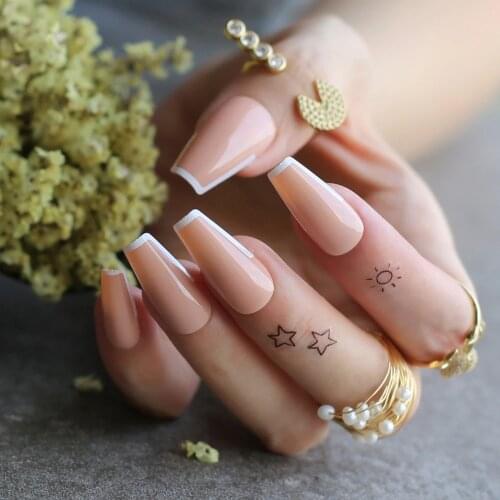 White tipped coffin nails out line UV french tips nude glossy fasle nails sophisticated nude with little bit of tipping edge