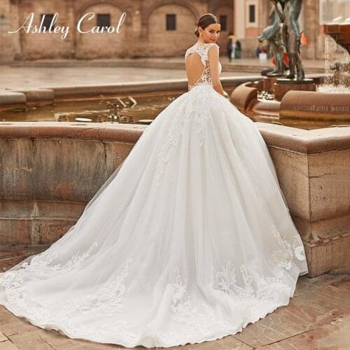 Ashley Carol A-Line Wedding Dress 2021 Glamorous Backless Princess Bride V-Neck Sleeveless Beaded Appliques Vintage Bridal Gowns