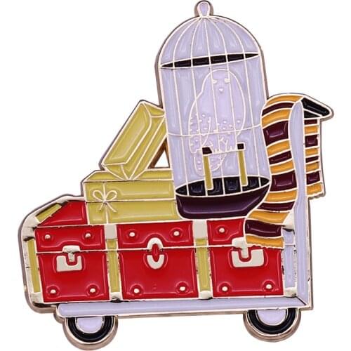 Train boarding scene pin from movie series the philosopher’s stone featuring a white owl and a large trunk