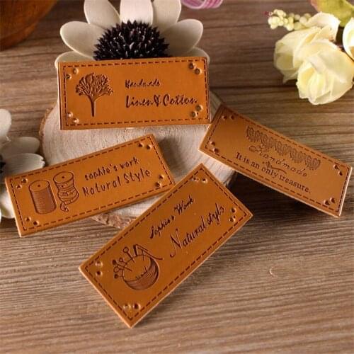 New 4 styles 100 Pcs/Set Handmade Patchwork PU leather Tags DIY Sewing label cloth Garment Labels For Sewing Accessories