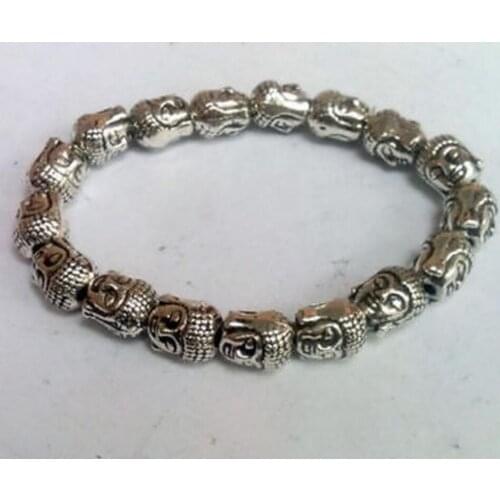 New hot Tibet Silver Buddha Head Chinese Old Handwork Amulet Elastic Bracelet