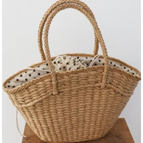 New straw woven bag womens handbag beach bag dumpling type drawstring woven bag with hand gift basket