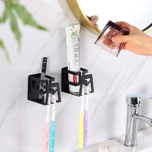Modern stainless steel toothbrush holder perforated cup holder black wall-mounted toothbrush holder toothpaste storage