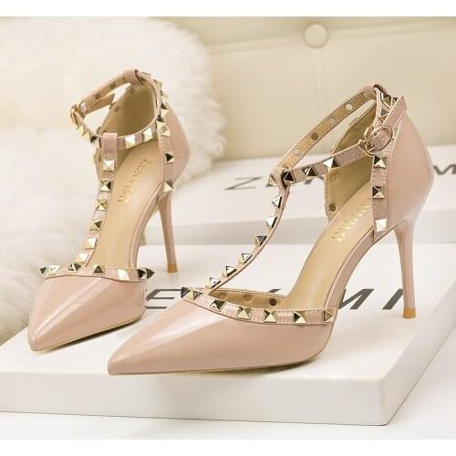 DDYZHY Roman fashion rivet sandals 10CM PUMPS Woman shoes Sexy nightclub stiletto heels patent-leather metallic rivet hollow2021