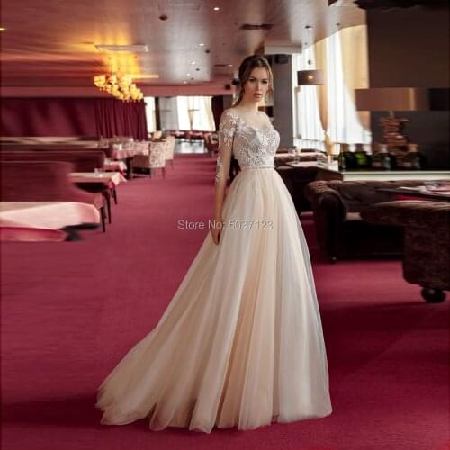 2020 Champagne A Line Wedding Dresses Lace Appliques Three Quarter Scoop Bridal Gowns Open Back Sweep Train Vestido De Noiva