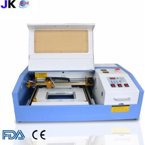 Free shipping Quality 3020 power laser engraving machine,Co2 laser engraver 40w,industrial laser cutter,big power laser module