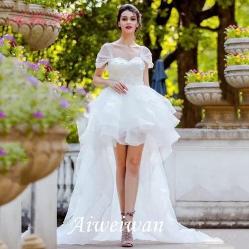 A-Line Wedding Dresses Bateau Neck Chapel Train Asymmetrical Organza Short Sleeve Country Romantic Dress Cute with Ruffles 2021