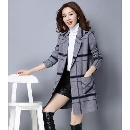 Korean version of the fall and winter clothes loose knit cashmere sweater and long-sleeved cardigan jacket coat child grid