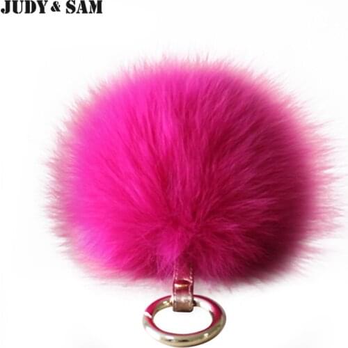 Brand fashion Luxury Bag Charm Big White Fox Fur Pom Poms with Genuine Leather Tag Colorful Lovely Fur Balls Apparel Accessory