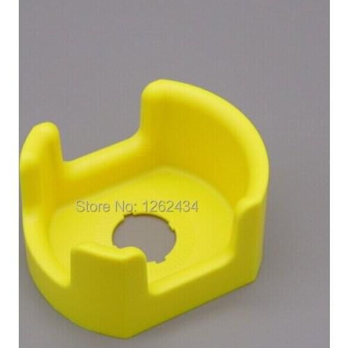 Emergency stop protection cover mounting holes covered with yellow protective cover 22 mm