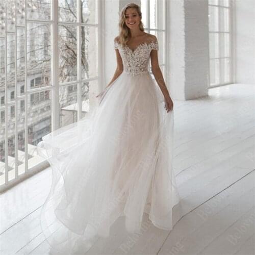 Vestido De Noiva 2020 Charming Wedding Dresses Sheer O-Neck Short Sleeves Pearls Applique Tulle A-line Bohemian Bridal Gowns