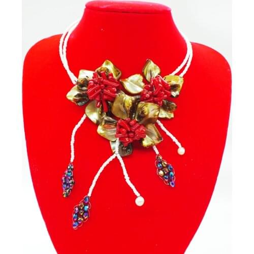 Very classic, shells. Coral flower necklace 19"