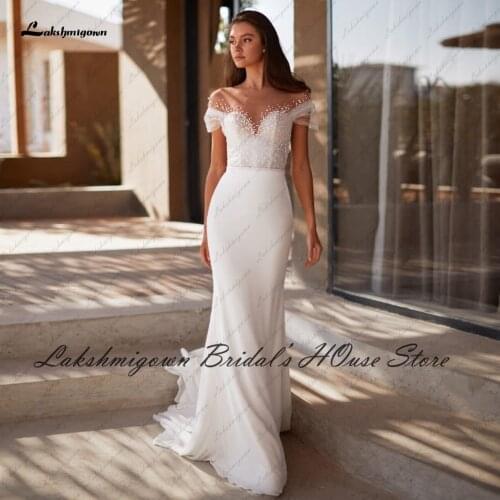 Stylish Women Mermaid Wedding Dress 2021 Robe Longue Sexy Bridal Pearls Beaded Princess Wedding Dresses Cap Short Sleeves