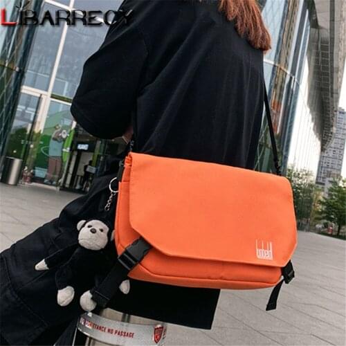 Soild Color Designer Womens Shoulder Bag Cute Pendant Design Women Student Bags High Quality Oxford Cloth Ladies Crossbody Bag