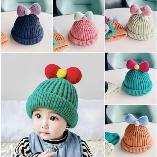 Children Beanies Cute knitted hat Bowknot autumn and winter girl baby earmuffs warm wool hedging baby hat lace lace Beanies hat