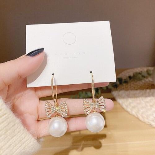 Korean Style Earrings 2021 Fashion New Temperament Earrings Super Fairy Crystal Wild Pearl Net Red Crystal Bow Womens Earrings