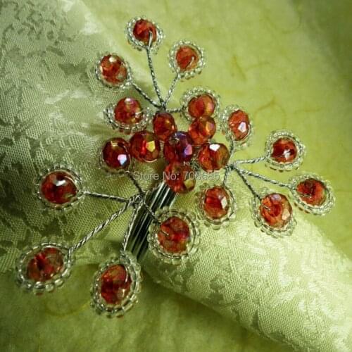 Red acrylic flower napkin ring with glass beads