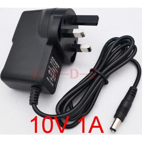 100PCS High quality AC 100V-240V Converter Switching power adapter DC 10V 1A 1000mA Supply UK Plug DC 5.5mm x 2.1-2.5mm