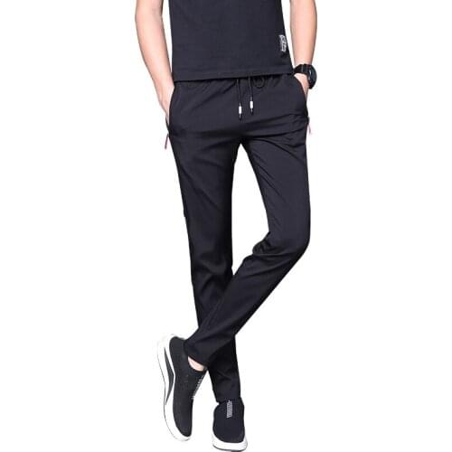 Casual pants men plus velvet mens sports pants men Korean mens pants autumn and winter padded casual trend pants