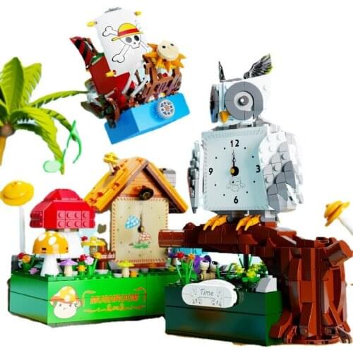 T2024-30 Cartoon Clock Music Box Owl Pirate Ship Mushroom House Assembled Childrens Toy Building Blocks for gifts